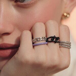 5 ring set. Size 7 Silver Tone- Black and Purple. BNWT